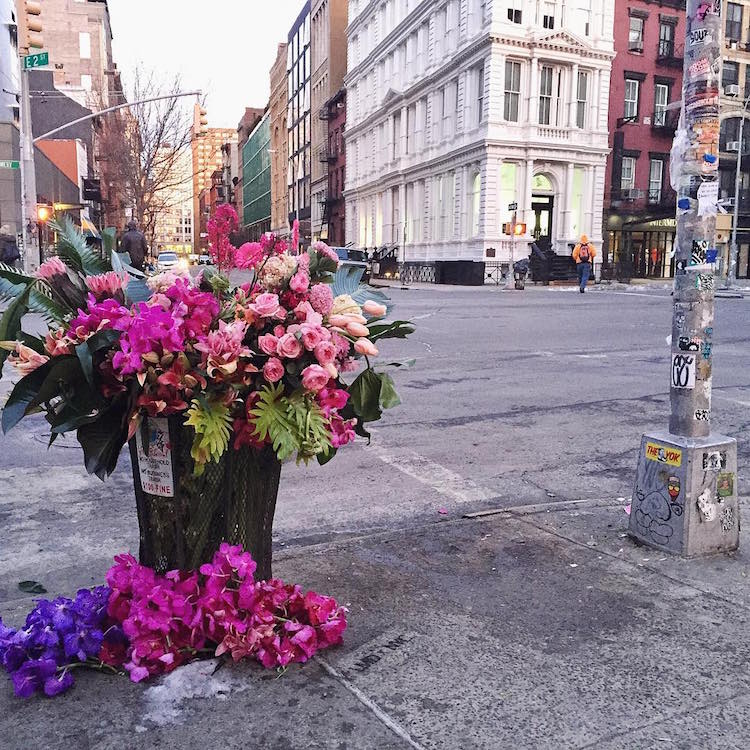 trash cans filled with flowers new york