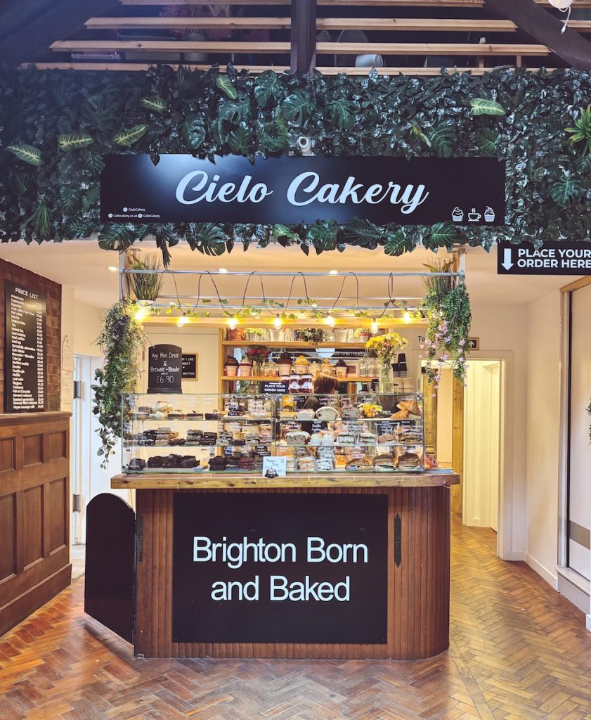 Cielo Cakery, a Brighton cafe inside a converted church and with a leafy green kiosk display counter