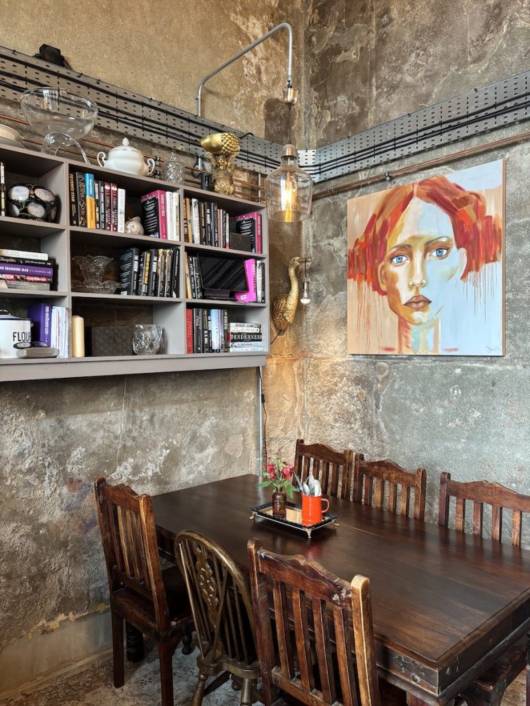 The interior of The Reading Room cafe in Brighton filled with books and art
