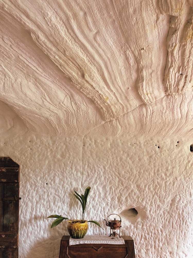 inside a house within a cave