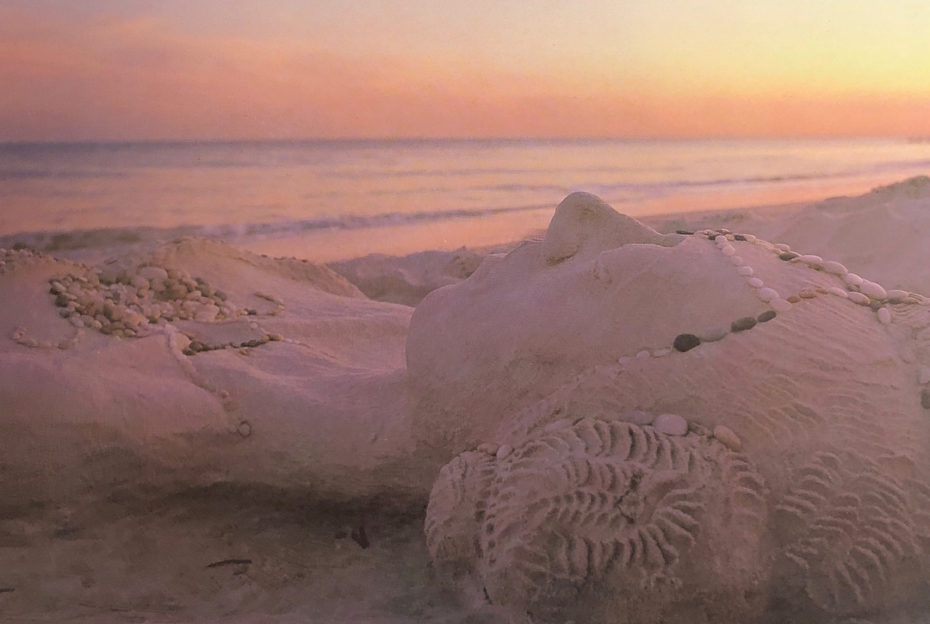 sunset over sandy beach