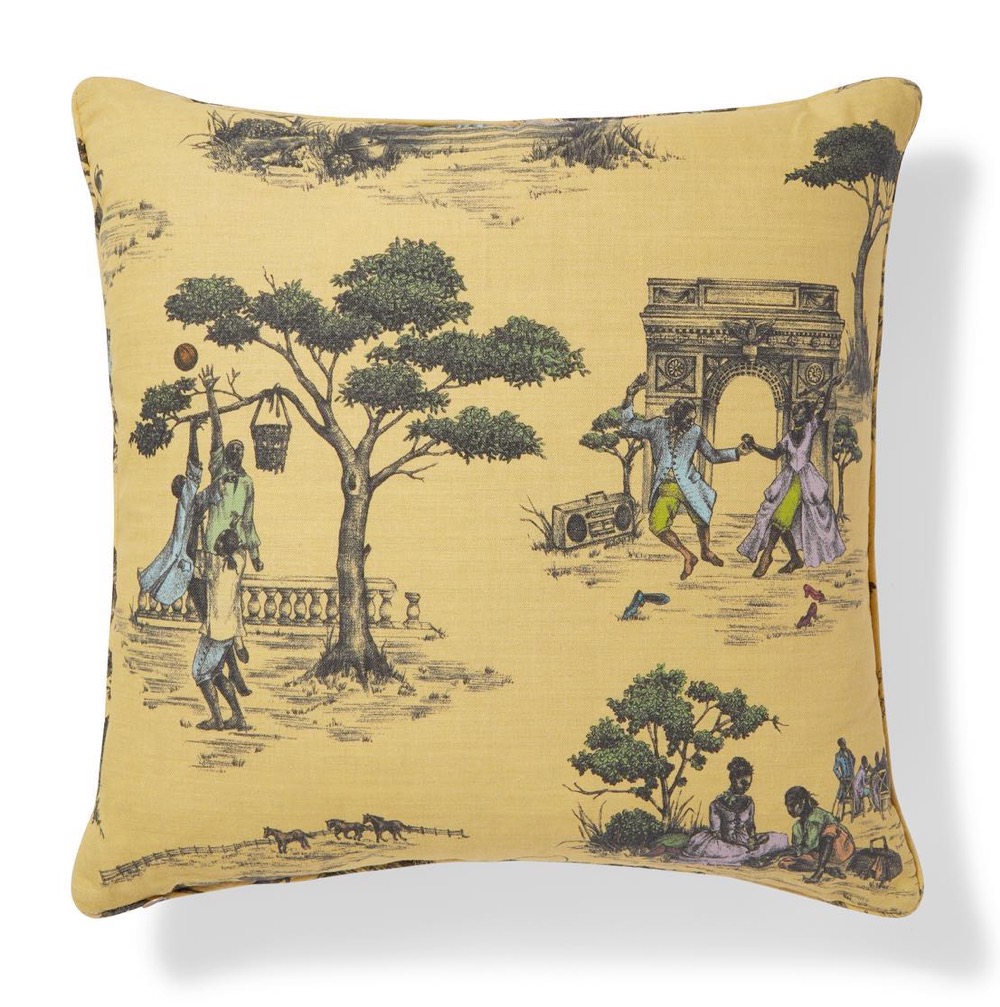 harlem toile fabric by sheila bridges on a cushion