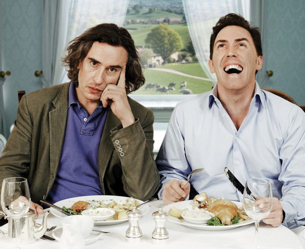 two actors at a table