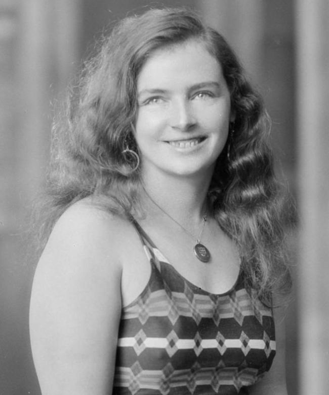 black and white portrait photo of a lady in a swimsuit
