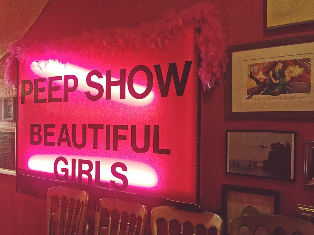 peep show neon sign