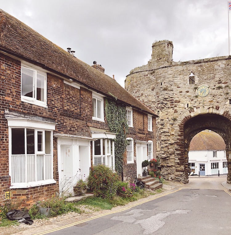 cottages by stone gateway