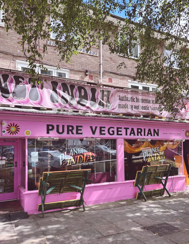 Colourful exterior of Planet India restaurant in Brighton