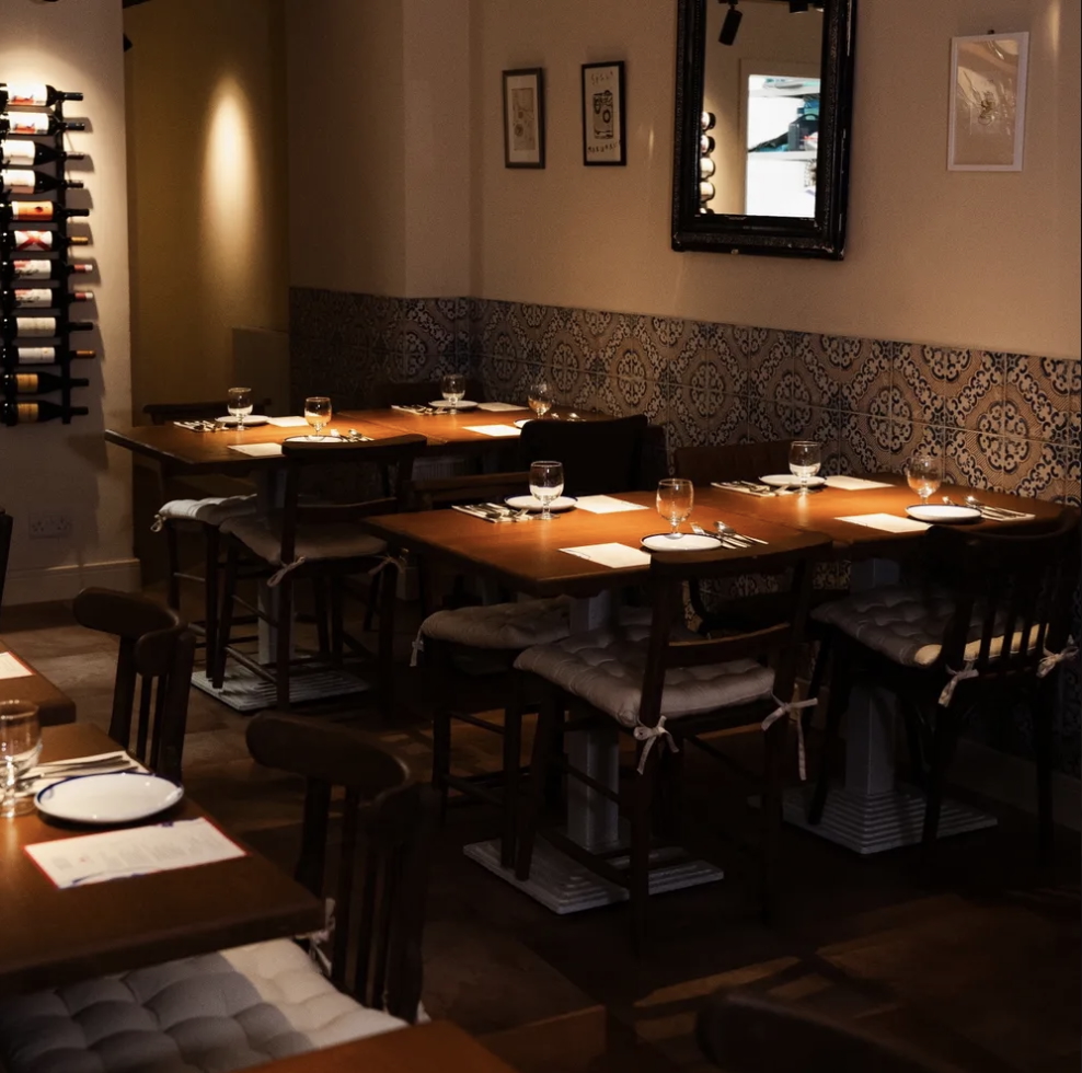 The low-lit interior of Spanish restaurant, Amari in Brighton