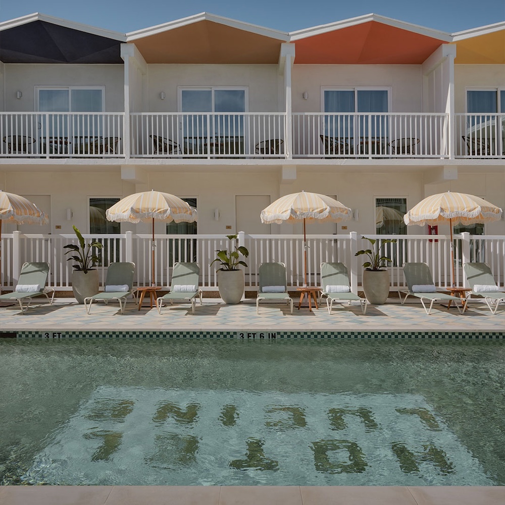 Pool and colourful zigzag roofline at Hotel Lucine in Galveston, Texas